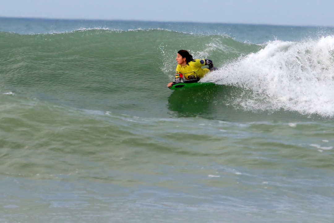 Woman Bodyboarding in Newquay Cornwall