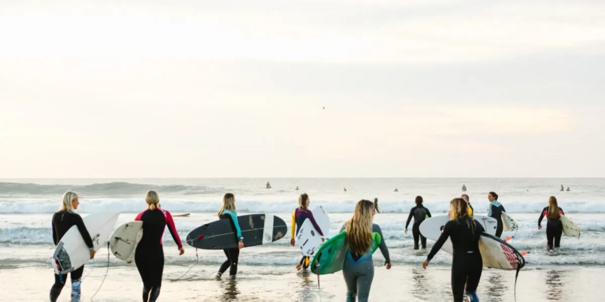 Female surfers on the beach