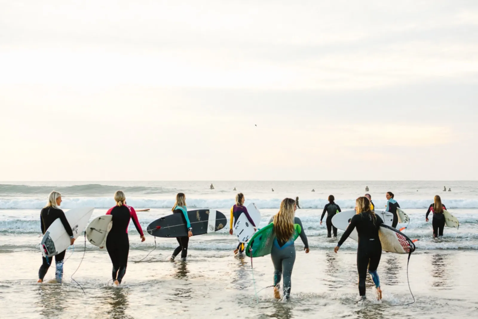 Female surfers on the beach