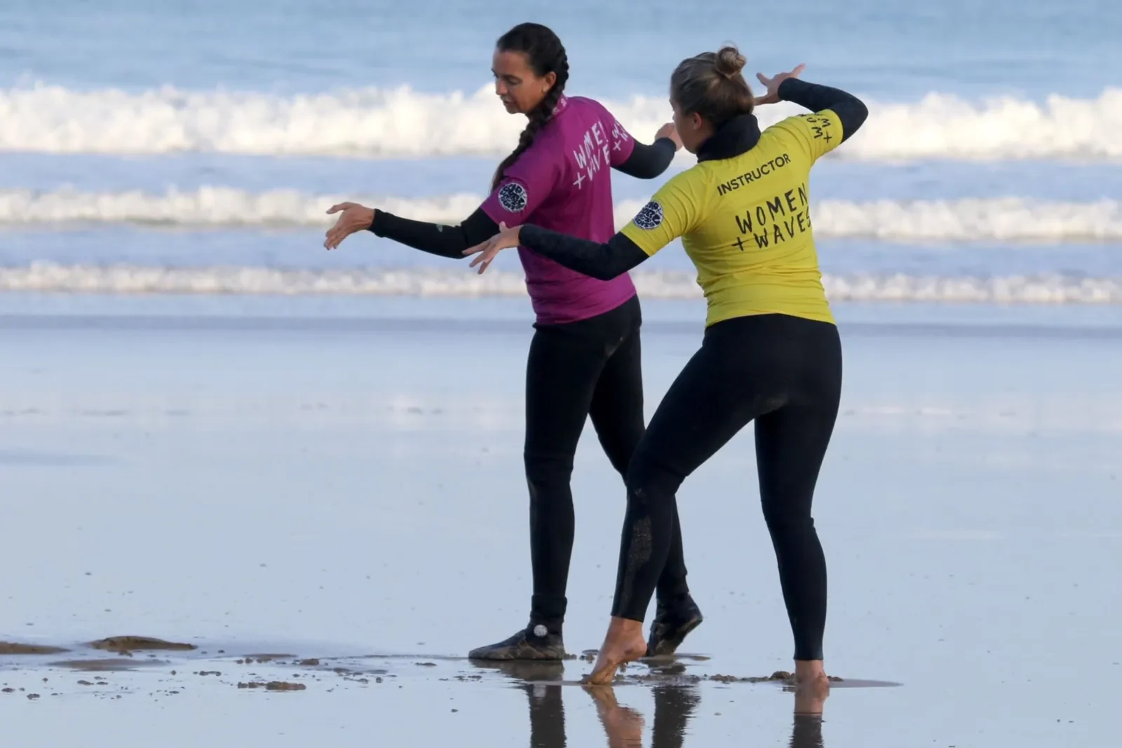 Two female surfers