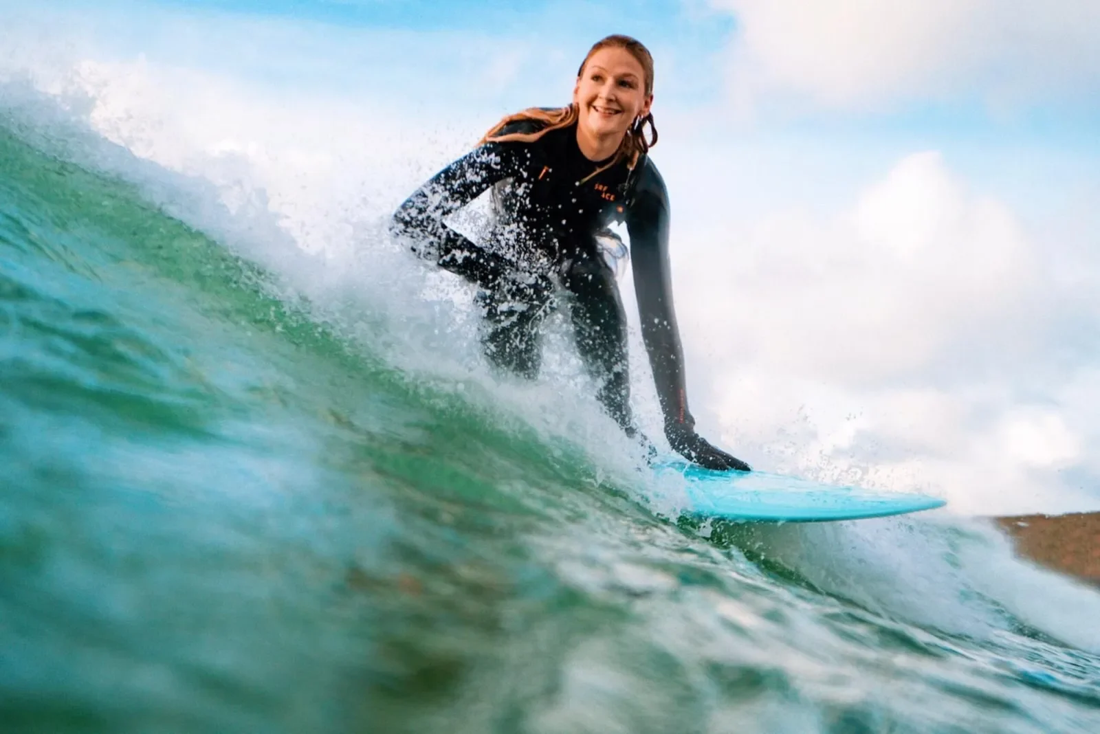 Lady surfer smiling
