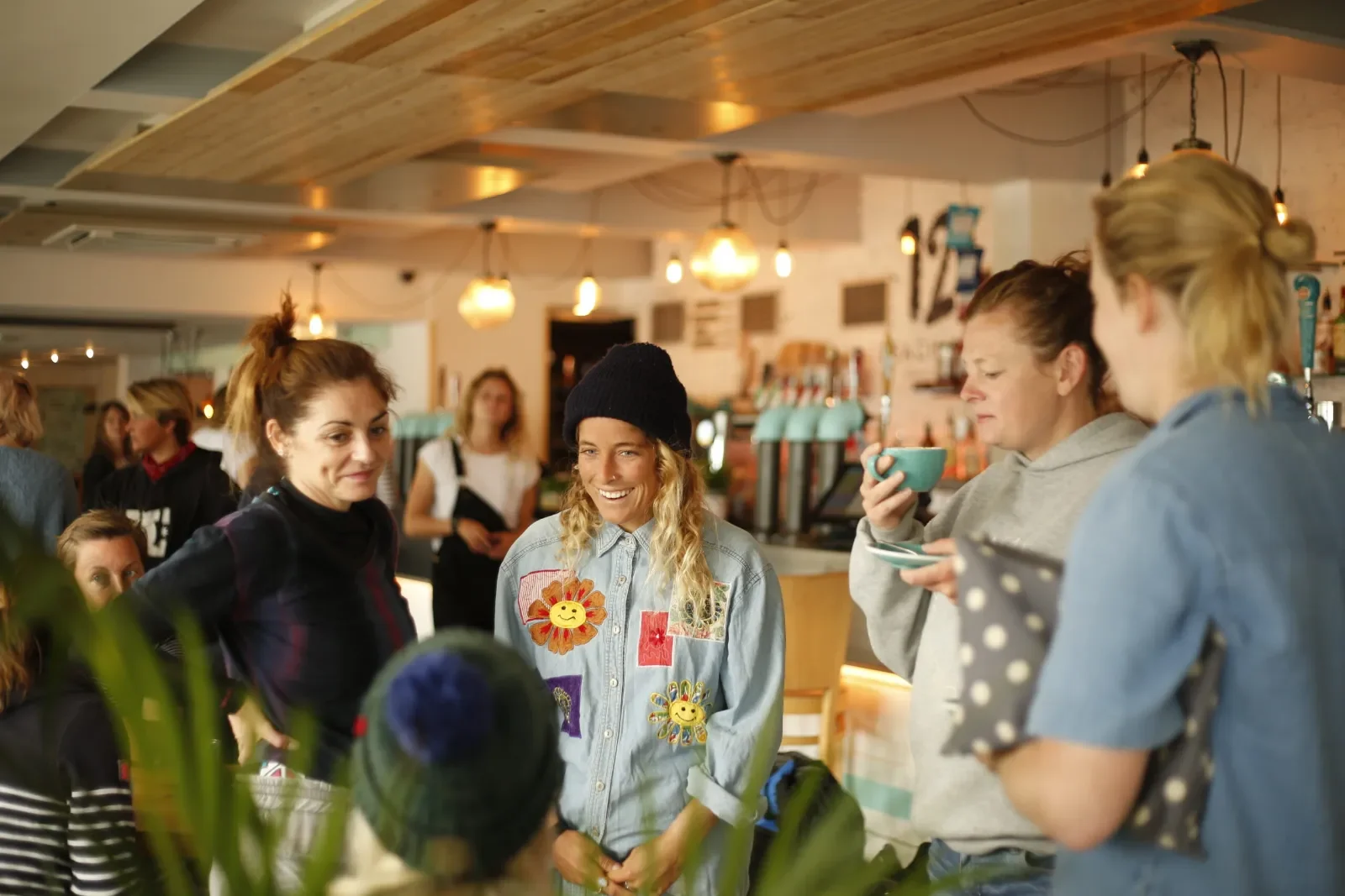 Group of surfers in a bar