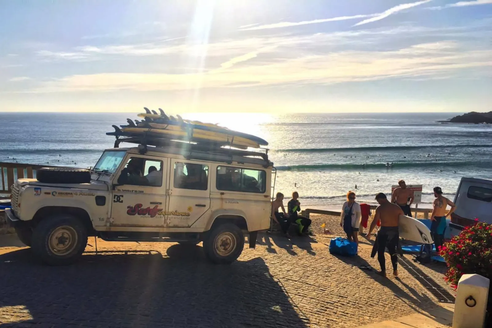 Portugal surf camp car with surfboards on roof