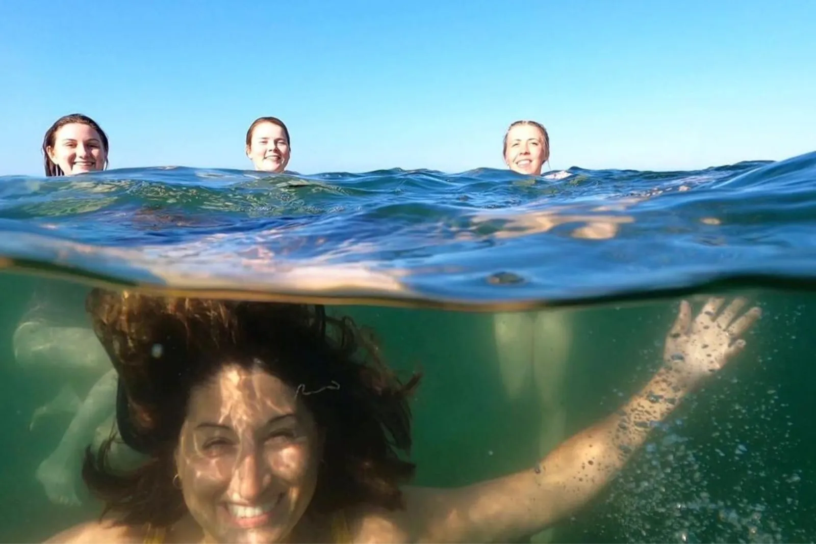 Underwater swimming ladies